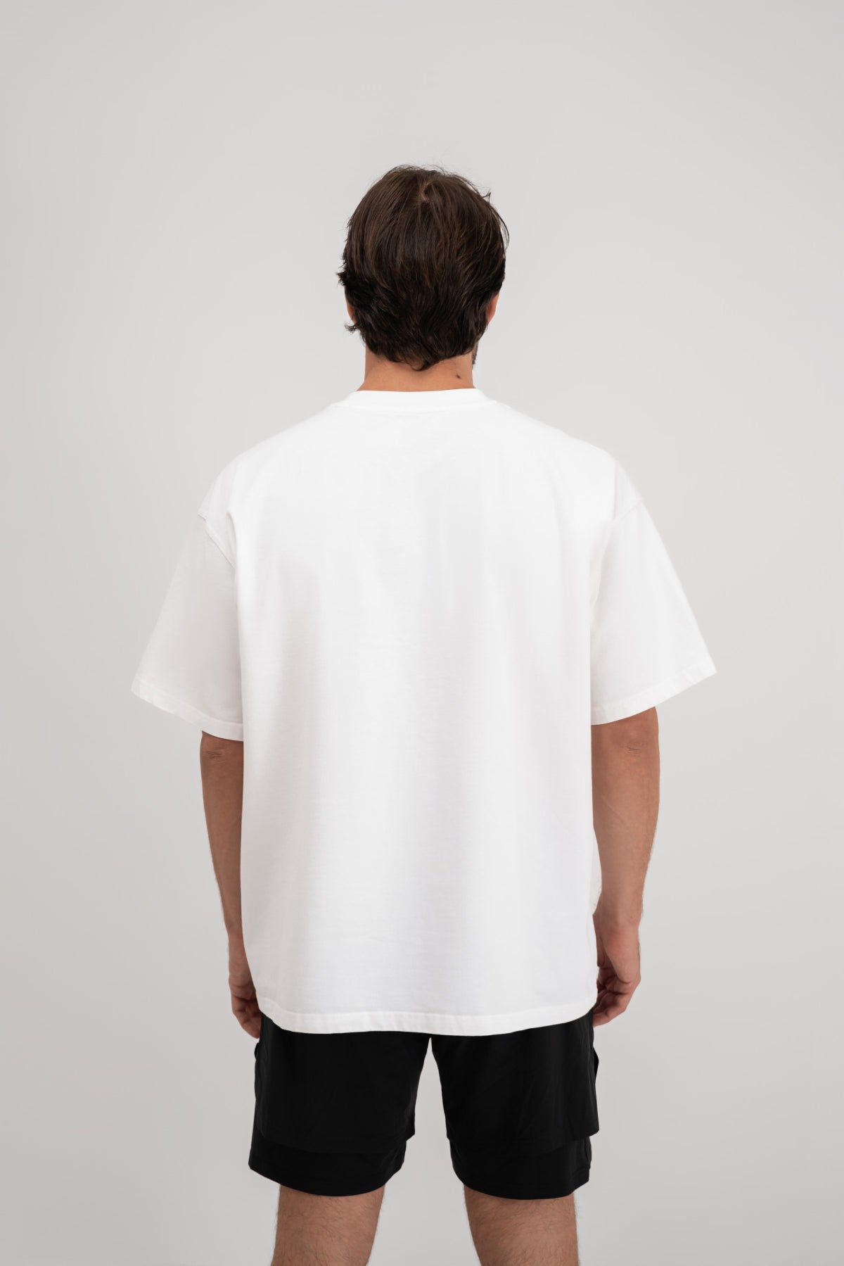 Bijela muška majica Essentials White Être - oversized fit stražnji pogled, kratki rukavi, premium casual odjeća